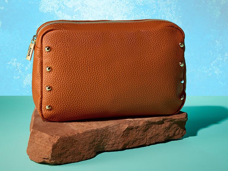 Resized Media/0825 LEMysteryBag Bag1 SLIDE18 5x4 2401PDP 1