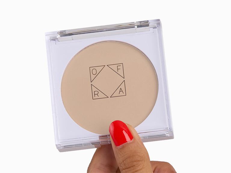Resized Media/OFRACOSMETICSPureMatteFinishingPowderInFairLight InHand 2096
