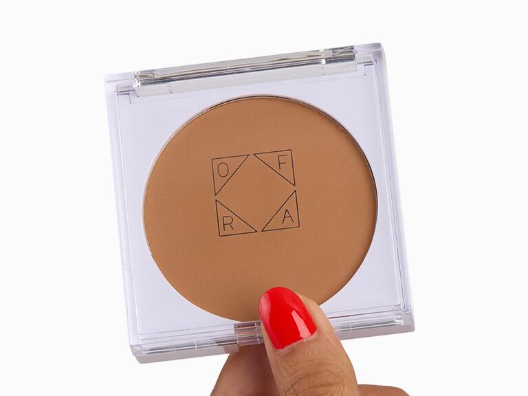 Resized Media/OFRACOSMETICSPureMatteFinishingPowderInTanDark InHand 2096